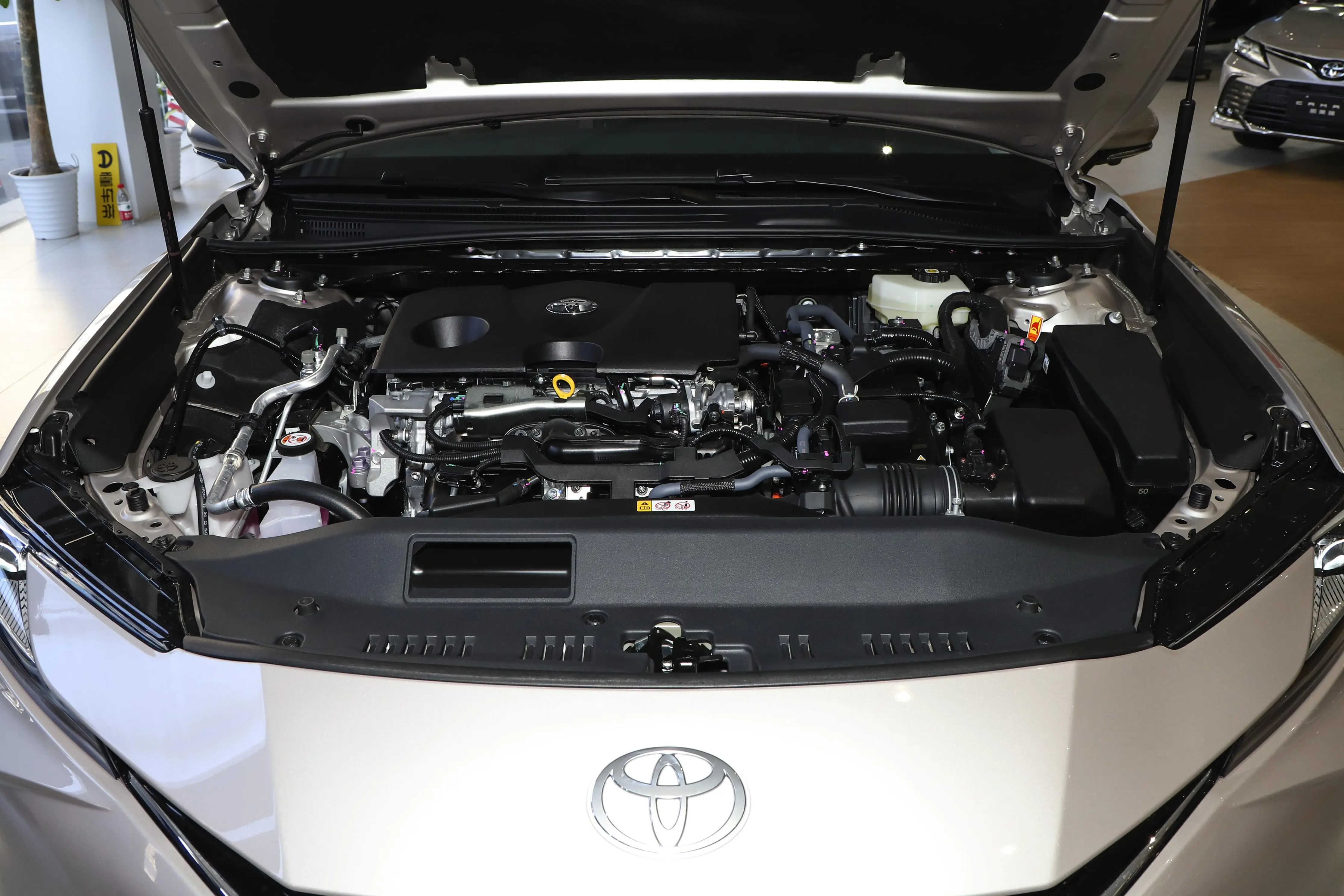 Camry hybrid with 2.0L engine for $25K